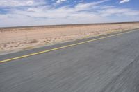 Africa: Rolling Plains with Clear Sky and Asphalt