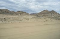 African Desert Landscape: Majestic Mountains in View