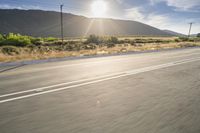 African Landscape: Mountains and Sunlight Under a Clear Sky