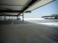 a airplane is sitting on a runway at an airport in motion by itself to take off