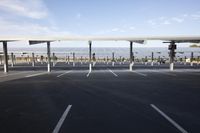 parking lot with several rows of solar panels and poles for parking on the roof in an airport