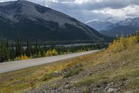 Alberta, Canada: Aerial View of Road, Mountain, and Forest