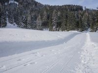 Alpine Road: A Breathtaking Mountain Range on a Clear Day