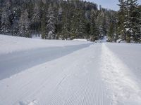 Alpine Road: A Breathtaking Mountain Range on a Clear Day