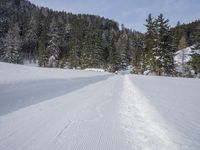 Alpine Road: A Breathtaking Mountain Range on a Clear Day
