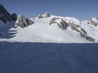 The Alps: A Breathtaking Landscape of Mountains and Clear Skies