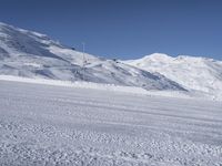 Alps Ski Slopes: Mountains and Clear Skies