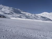 Alps Ski Slopes in the Mountains with Clear Skies