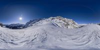 3d snow - covered slope looking over an aerial view at a mountain and two airplanes passing over