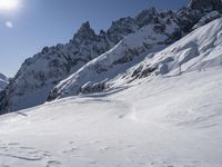 an image of someone on skis going down a mountain trail to get a jump