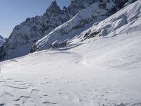 an image of someone on skis going down a mountain trail to get a jump