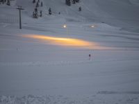 snow is piled over at a ski slope in the mountains with snow everywhere around it