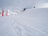 The Alps: A Tourist Attraction for Skiing on Snowy Slopes