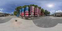 a panorama lens of the american flag painted in red, white and blue and blue