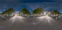 360 - angle view of a building with many streets at night along it's sides