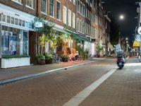 Amsterdam Night: Street Lights and Storefronts