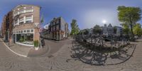 the image shows a 360 - shot of buildings in a town square in the netherlands