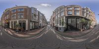 a fish eye view of buildings in an urban area that is empty and looks very interesting