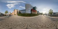 the view from a fish eye lens of a building with an arch on it's sides