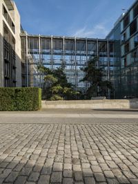 an image of a parking area outside a modern building in france by andy martin photography