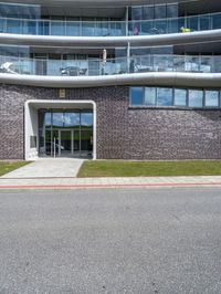 a view of the exterior of a building on a cloudy day with no people or vehicles on it