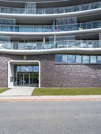 a view of the exterior of a building on a cloudy day with no people or vehicles on it