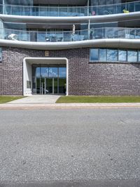 a view of the exterior of a building on a cloudy day with no people or vehicles on it