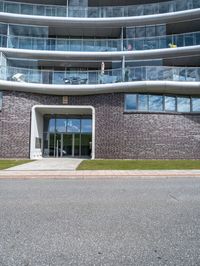 a view of the exterior of a building on a cloudy day with no people or vehicles on it