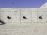 Architectural Wonder: Concrete Wall and Road Surface