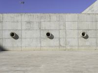 Architectural Wonder: Concrete Wall and Road Surface