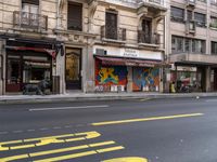 a building with a large window that reads janus journal and a street with traffic