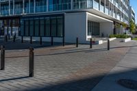 the view from the sidewalk on the sidewalk is empty, so it is clear and the building is made up with windows