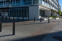 the view from the sidewalk on the sidewalk is empty, so it is clear and the building is made up with windows