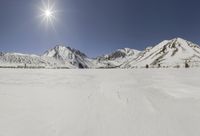 Arctic Mountain Range with Snow and Ice Lake