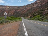 this is an image of a road in the desert area in the usa in the middle of nowhere