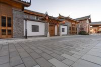 an asian courtyard and building in the city of peking, china of this picture you can see an oriental style