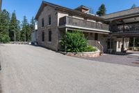 a stone house with a sign in front of it that says the building where the winery is