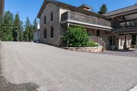 a stone house with a sign in front of it that says the building where the winery is