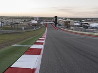 this is a straight track with a red and white strip in the middle of the picture