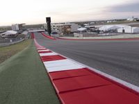 this is a straight track with a red and white strip in the middle of the picture