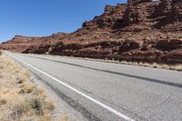 Asphalt Highway through Utah Mountain Landforms