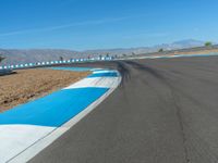 Asphalt Race Track in the USA: Daytime with Clouds