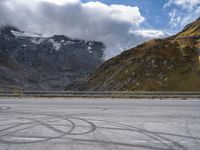 Asphalt Road in Austria: The Serenity of Lake and Mountain Range