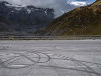 Asphalt Road in Austria: The Serenity of Lake and Mountain Range