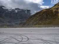 Asphalt Road in Austria: The Serenity of Lake and Mountain Range