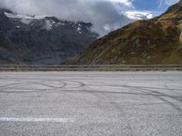 Asphalt Road in Austria: The Serenity of Lake and Mountain Range