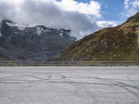 Asphalt Road in Austria: The Serenity of Lake and Mountain Range