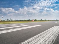 the runway is clean and has markings on it to indicate where they are at the start