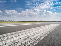 the runway is clean and has markings on it to indicate where they are at the start