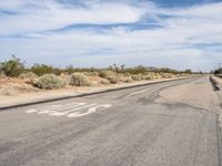 Asphalt Road Under Clear Skies in California